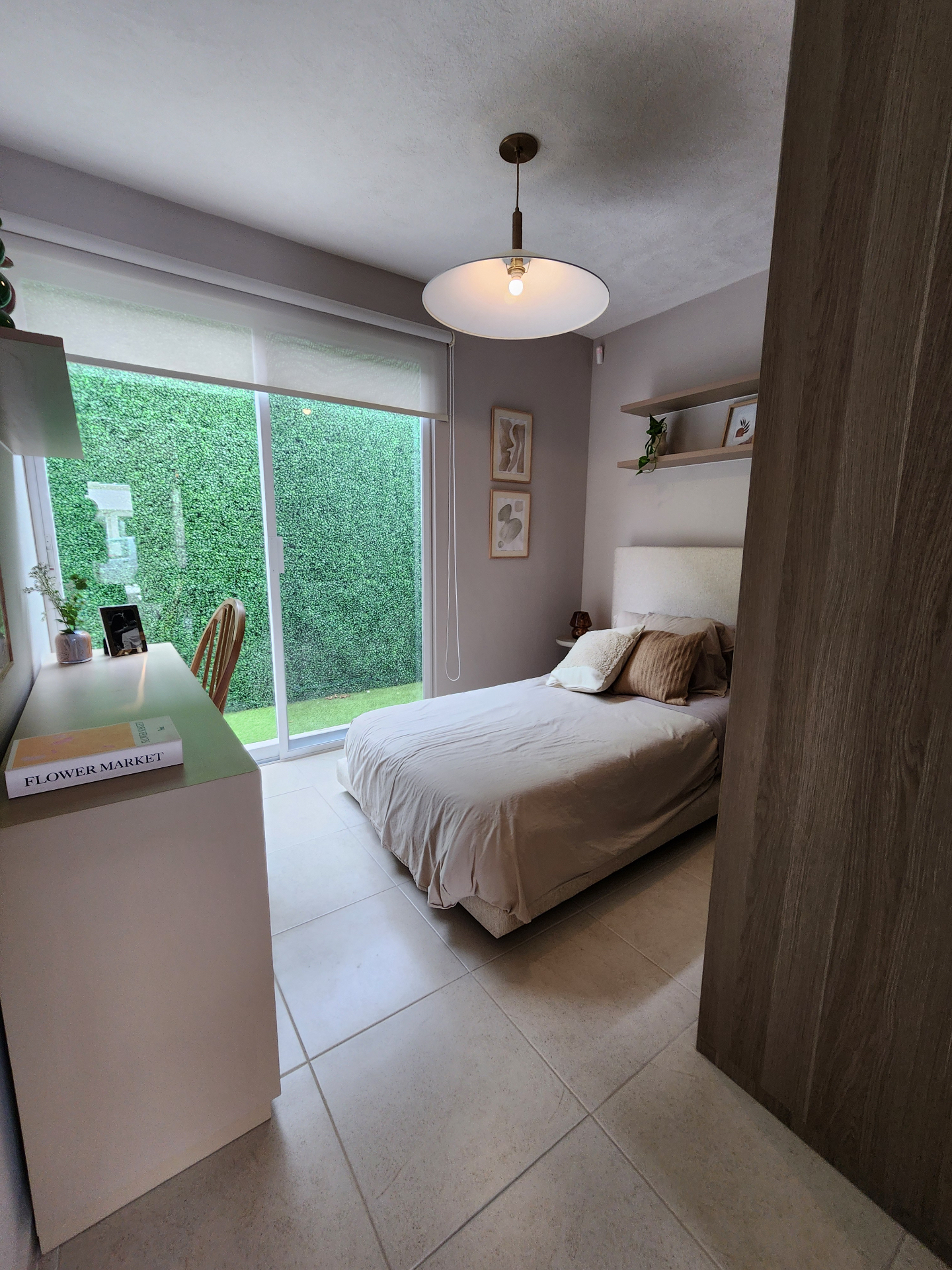 Habitación con acceso al jardín