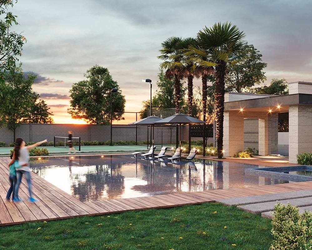 Amenidad: alberca con deck de madera, asoleaderos y vista al atardecer