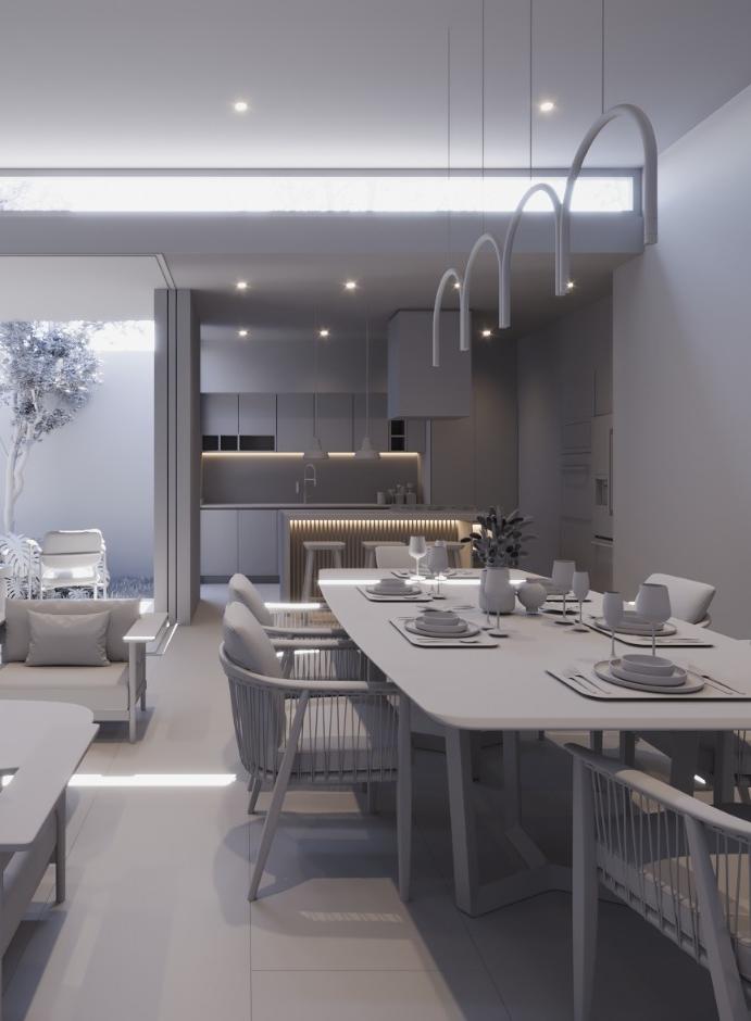 Comedor con candil escultórico y cocina abierta hacia el jardín